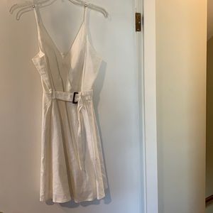 Cream flowy dress with buckle detail